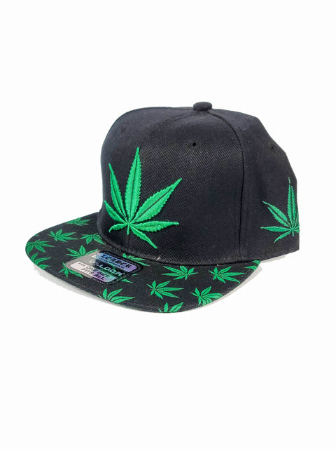Black snapback with green canna leaf and on bill